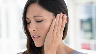 What causes otitis media and how is it treated?