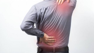 What are degenerative diseases of the spine and how are they treated?